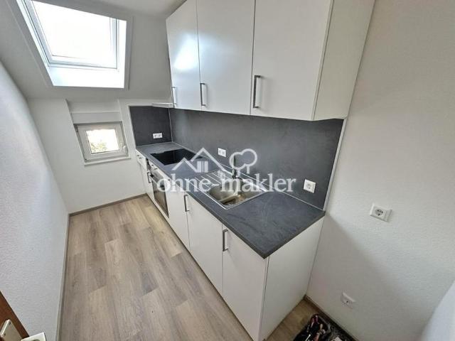 Dachwohnung 2.OG mit EBK, Dachterrasse + Stellplatz in angenehmer Lage von Kirrlach!