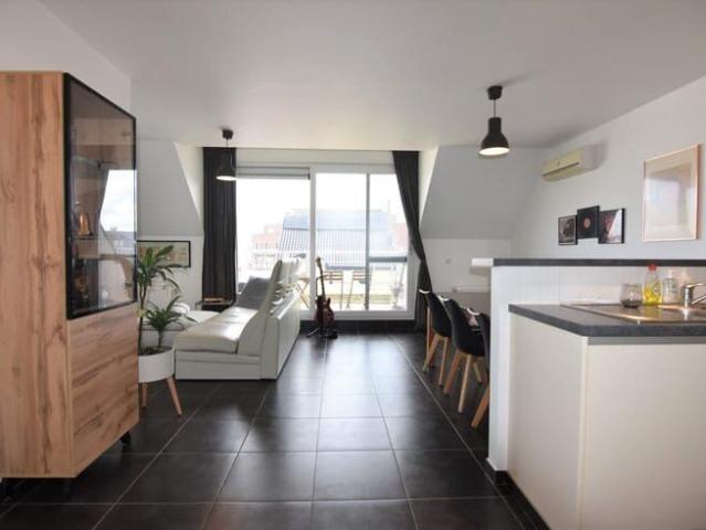 Dakappartement met groot terras en garagebox