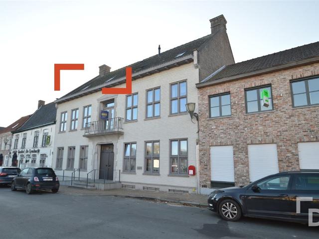 Dakappartement met zicht op het dorpsplein