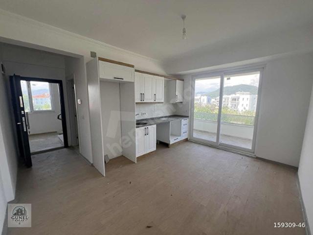 DALAMAN MERKEZİ KONUMDA SATILIK 1+1 BAHÇE NİZAM DAİRE