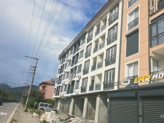 DALAMAN GAZİ BULVARINDA 1+1 SATILIK DAİRE 65 m 2 BALKON