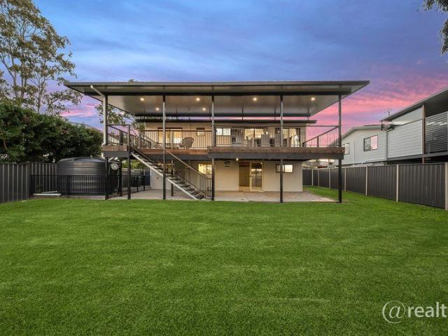 DAZZLING RENOVATED ENTERTAINER'S DREAM WITH HUGE ENTERTAINING DECK ALL SET ONLY 30m TO SCHOOL!