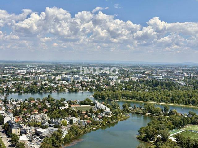 DC2 Tower: 46. Etage mit Sonnenaufgang und Wasserblick Erstbezug