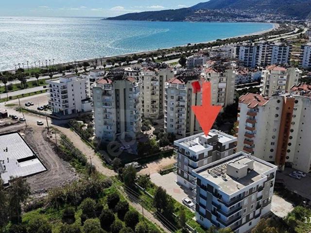 DENİZ MANZARALI AYRI MUTFAK VE ARA KAT İSKANLI GENİŞ 2+1 DAİRE