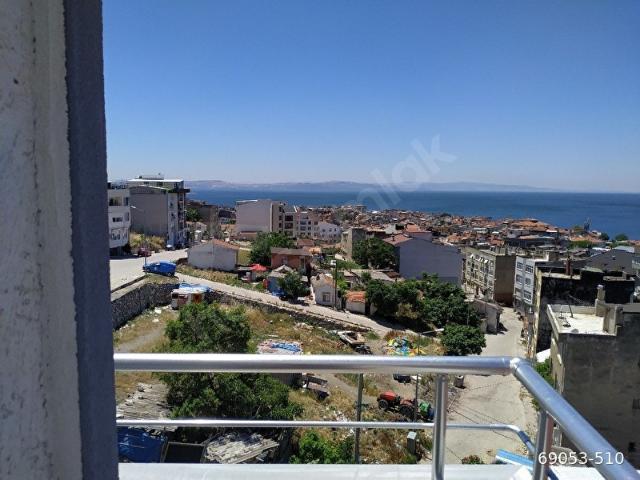 DENİZ MANZARALI,KOMBİLİ,ASANSÖRLÜ SIFIR DAİRE SATILIKTIR