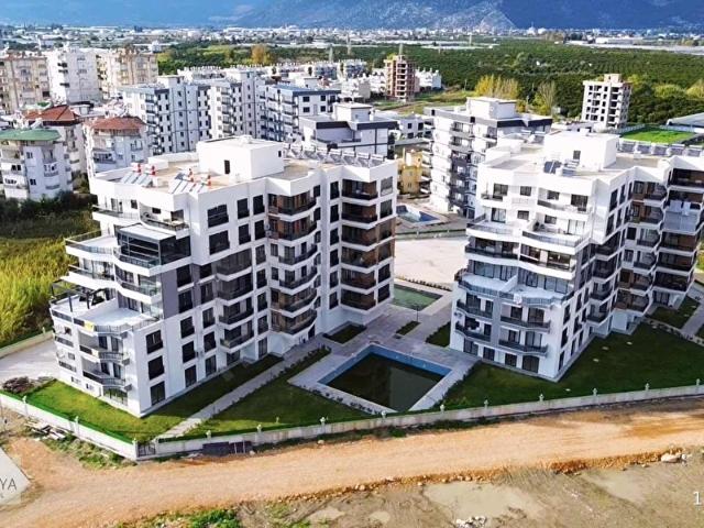 BATI ANTALYA'DAN DENİZE SIFIR DONATILI SİTE İÇİ SATILIK 1+1 DAİR