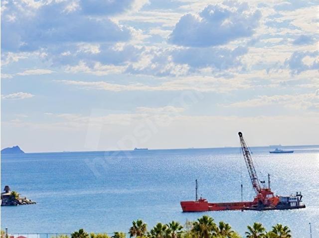 DENİZ VE MARİNA MANZARALI SIFIR BİNADA BALKON KAPALI OTOPARK