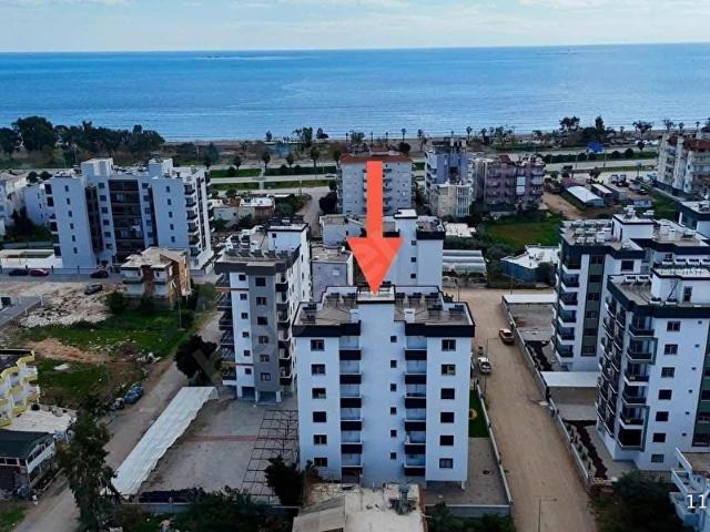DENİZE ÇOK YAKIN SİTE İÇİ VE BOL EXTRALI AYRI MUTFAK 2+1 DAİRE