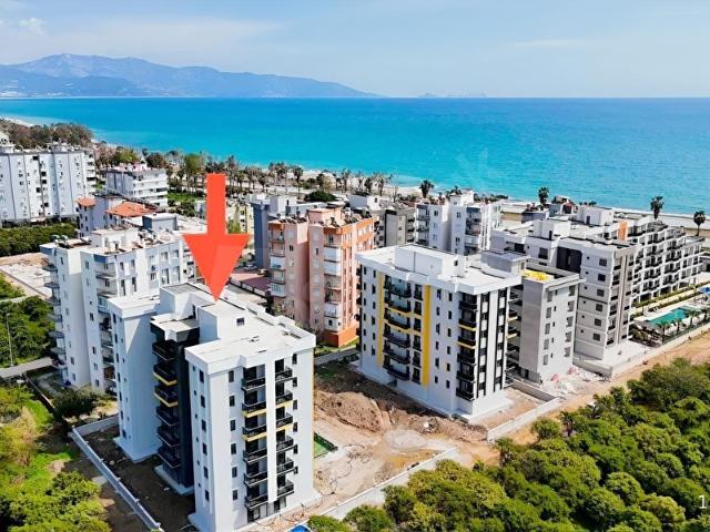 DENİZE ÇOK YAKIN SİTE İÇİNDE GENİŞ 1+1 SATILIK DAİRE