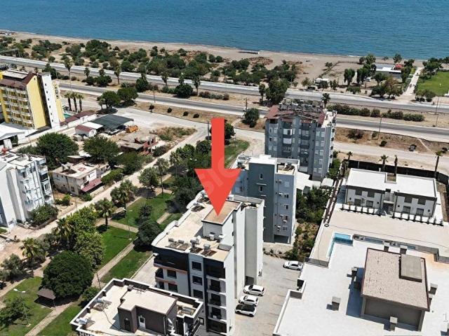 DENİZE ÇOK YAKIN VE ÖNÜ PARK OLAN EŞYALI SATILIK LÜKS 1+1 DAİRE