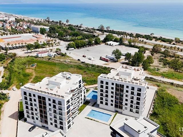 DENİZE SIFIR EŞSİZ MANZARALI VE ÇİFT HAVUZLU SİTEDE GENİŞ2+1