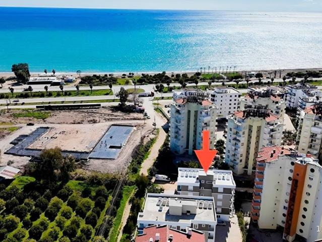 DENİZE SIFIR SİTE İÇİNDE AYRI MUTFAKLI GENİŞ 2+1 DAİRE
