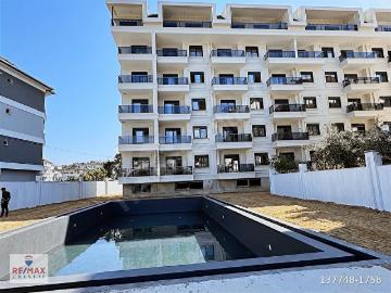 DENIZE YÜRÜME MESAFESİNDE FULL AKTİVİTELİ SİTEDE 1+1