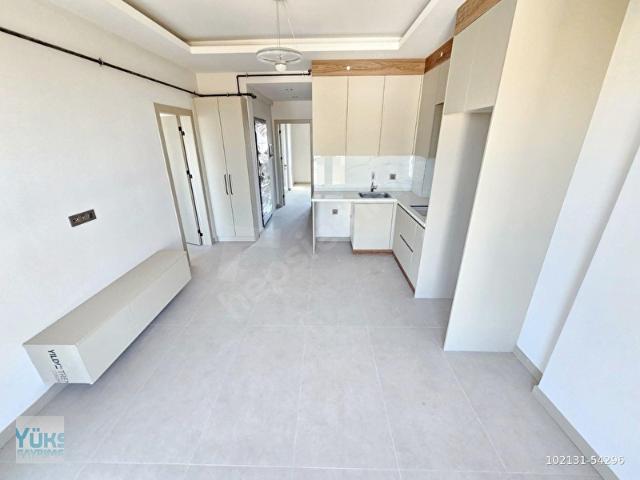 Denizli karahasanlı da 2+1 100 m2 cepheleri açık önü yeşil alan suit lüks daireler