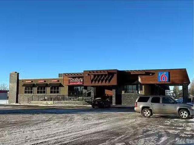 Unique 1119 2 Street West, Brooks, AB, T1R 0N9 commercial fo.