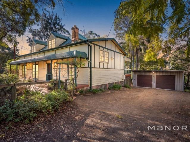 Deceased Estate: Prime Proximity Meets Country Charm on a Generous Half Acre
