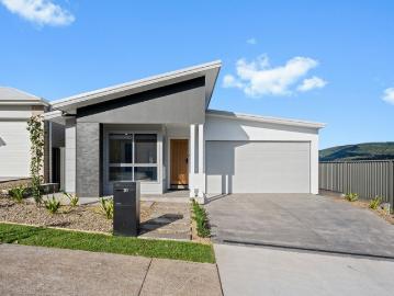 Deceiving in Size Near New Family Home with Premium Finishes & Scenic Views