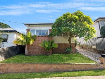 Deceptively Spacious, Irresistibly Charming! Ideal First Home or Investment