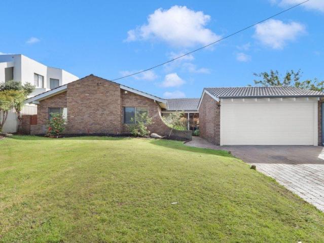 DECEPTIVELY SPACIOUS & SUPERBLY RENOVATED FAMILY HOME