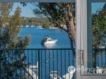 DEEP ABSOLUTE WATERFRONT HOME WITH JETTY, BOAT RAMP AND STUNNING VIEWS LAKE MACQUARIE