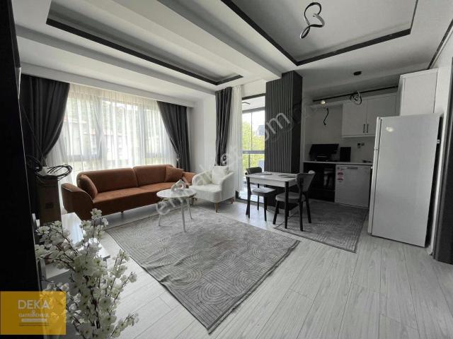 Deka Gayrimenkul'den Sıfır Eşyalı Cam Balkonlu Kiralık 1+1