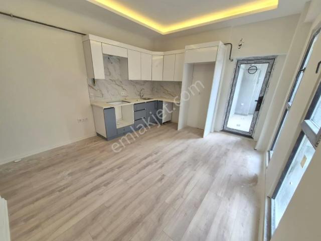 Delux'den Palm Suıts'te Cadde Cepheli Lux Satılık 1+1 Daire