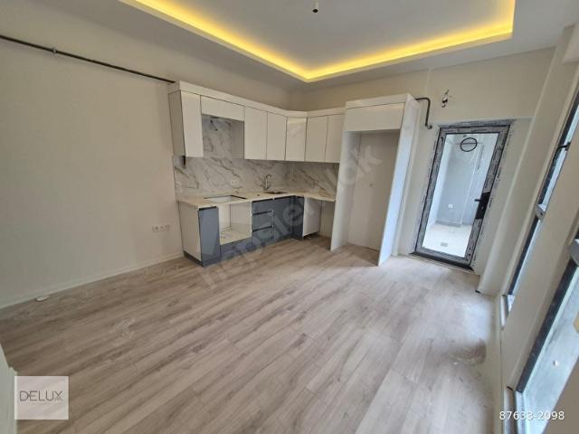 DELUX'DEN PALM SUITS'TE CADDE CEPHELİ LUX SATILIK 1+1 DAİRE