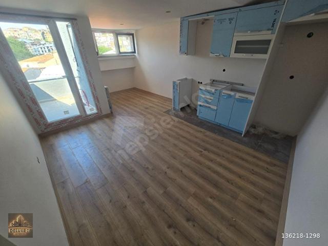 DELUXE 26 ' DAN YENİ BİNADA TAM MERKEZDE TERASLI 1+1 65 m2 DAİRE
