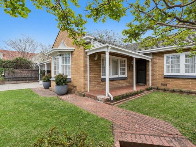 Delightful Solid Brick Home with Space, Style and Secure Parking