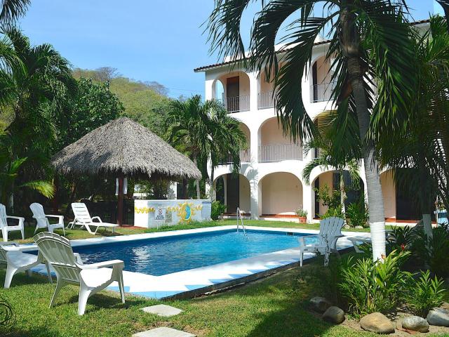 Departamento a pasos de la playa, alberca, palapa, amueblado, en venta Santa Cruz, Huatulco