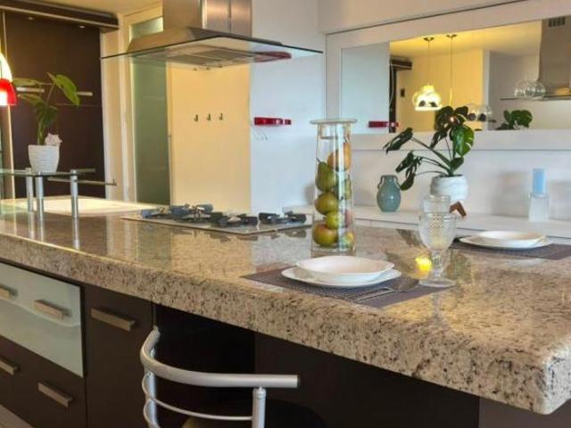 Departamento de 112 m² con 2 recámaras en venta en León y 2 estacionamientos, muros de ladrillo