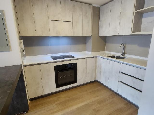 Departamento de 2 dormitorios y 2 baños y estaci. en ñuñoa