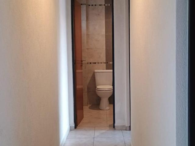 Departamento de 2 dormitorios con cochera en Alquiler