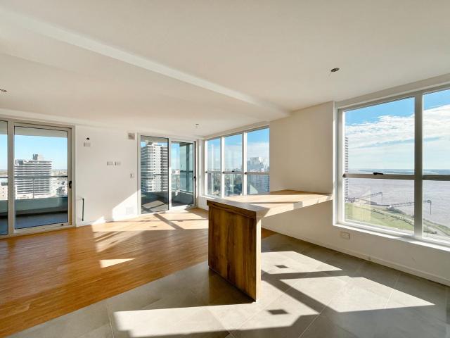 Departamento de 2 dormitorios con vista al r?o, cochera y amenities en alquiler