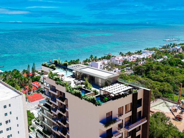 DEPARTAMENTO EN COSTA MUJERES, A LA VENTA CON 2 HABITACIONES, JUNTO AL MAR