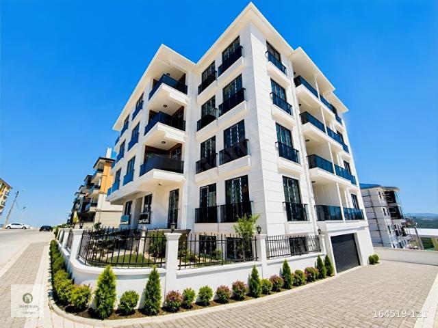 DERONAS'TAN ASSOS'A 15 DK AYVACIK MERKEZDE SIFIR LÜKS 2+1 DAİRE