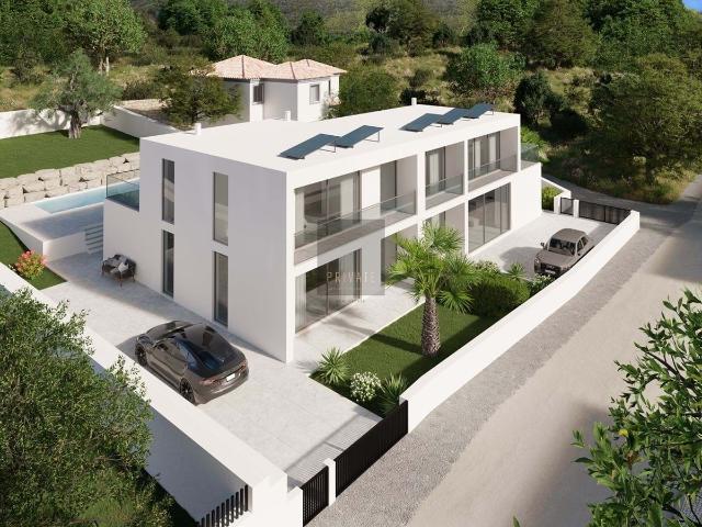 Descubra a casa dos seus sonhos: uma villa moderna com vistas costeiras de tirar o fôlego