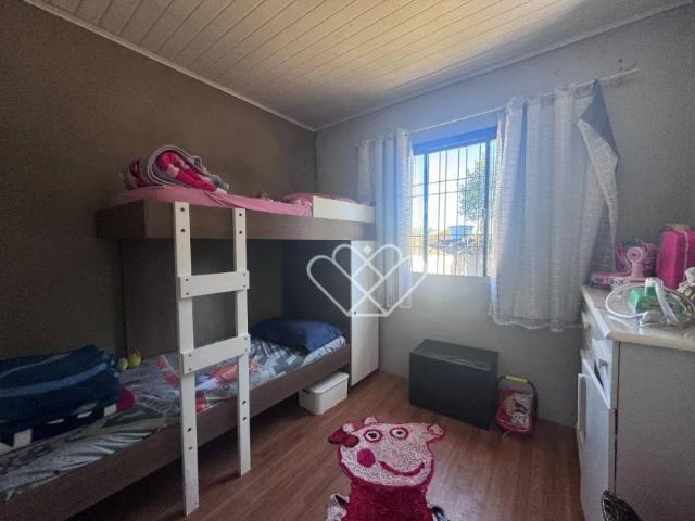 Descubra o conforto e a comodidade desta encantadora casa oferecida pela Brum Imob, localizada no tr