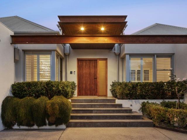 DESIGNED TO ENTERTAIN, PERFECTLY PLACED FOR COASTAL LIVING