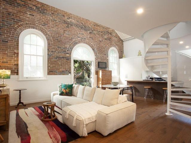 Designer three bedroom home in historic building with spiral staircase and private balcony in central location $2,200/week fully furnished inc bills