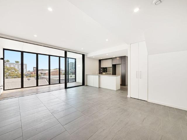 Designer Two Bedroom Split Level Apartment with Secure Parking