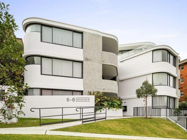Designer Apartment in Boutique Block Capturing Serene Ocean Views