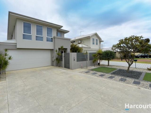 Designer Coastal Retreat in a Premier Canal Side Address Mandurah