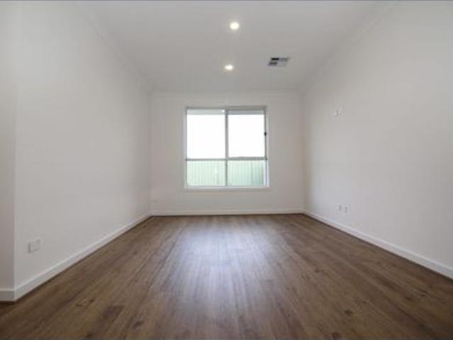 DESIGNER FAMILY HOME. 3 OR 4 BEDROOMS. REAR YARD