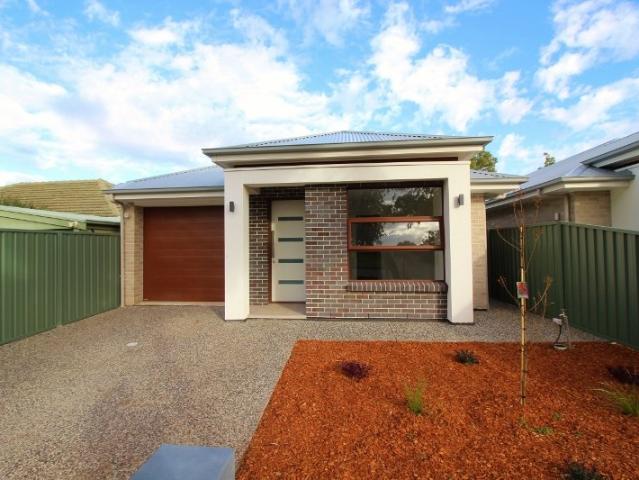 DESIGNER FAMILY HOME. 3 OR 4 BEDROOMS. REAR YARD