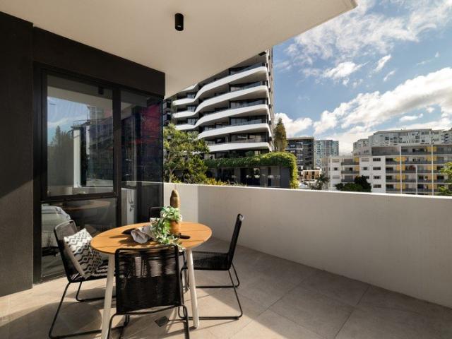 Designer Living Steps from the River