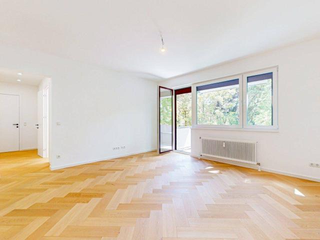 DESIGNERWOHNUNG IM COTTAGEVIERTEL | SÜD BALKON | 2 GARAGENPLÄTZE INKL