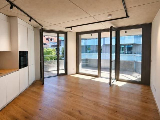 Designstarke Wohnung mit großem Balkon und maßgefertigter Einbauküche