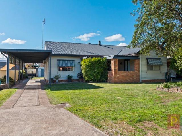 DESIRABLE DOWNTOWN LOCATION JUST MINUTES FROM GOLF COURSE!