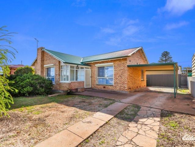 DESIRABLE LOCATION, EXCEPTIONAL POTENTIAL